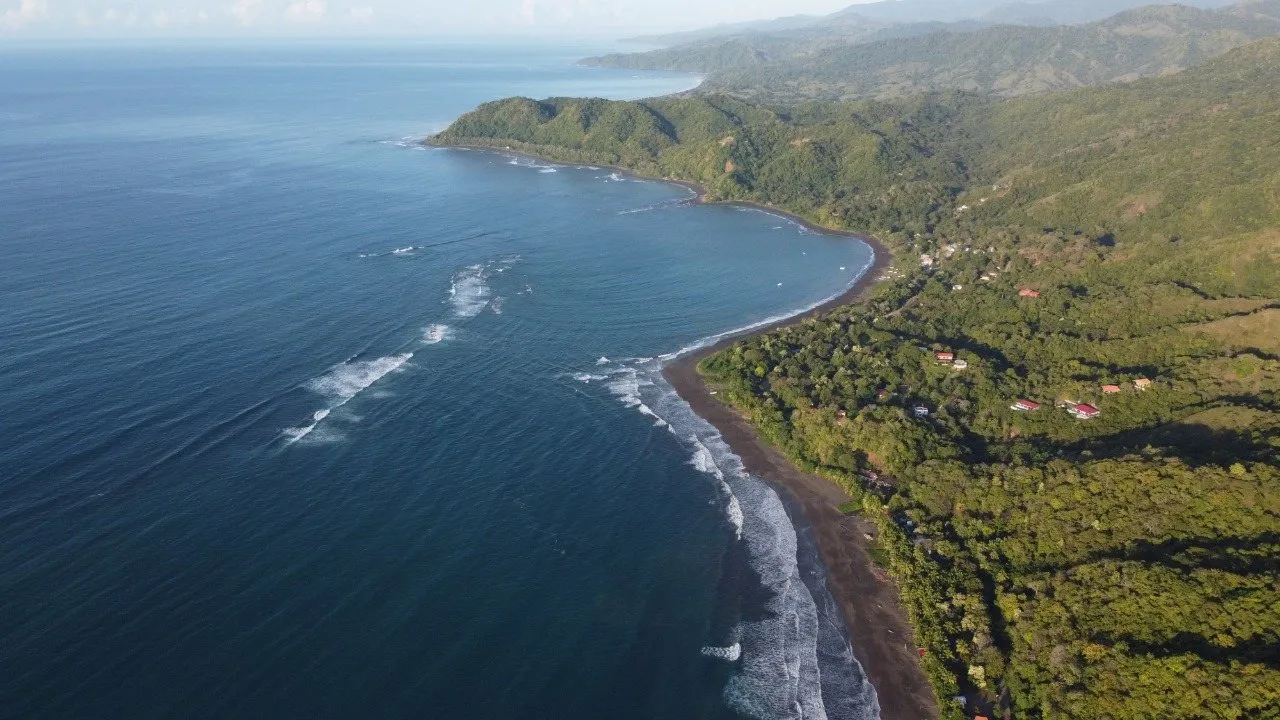 Aerial view of Cambutal’s coastline and jungle hills